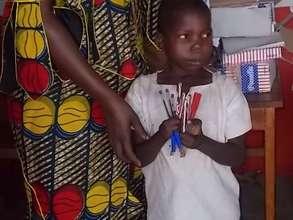 Happiness is pleased with her new pens and pencils