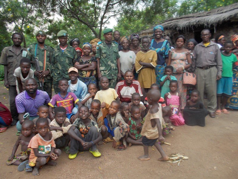 The Rwenena school community with military escort