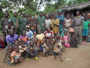 The Rwenena school community with military escort