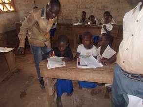 Supplemental instruction for 3d graders at Rwenena