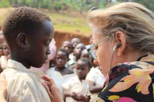 Dr. Sparrow examines a student