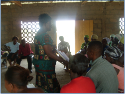 Lydia Sasu and rural farmers discuss food security