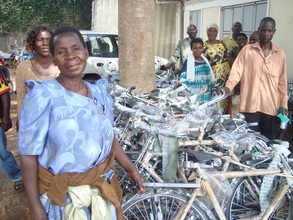 Community workers receiving Bicycles