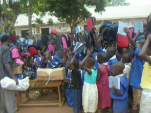 Children show their excitement to receiving packs