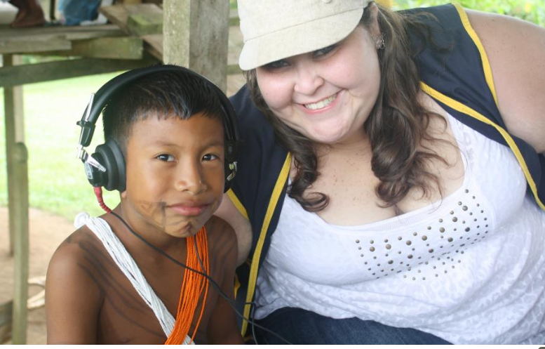 Audiologist Ivis Reina performing a hearing exam