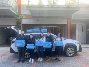 Subaru donates socks & shoes for our kids