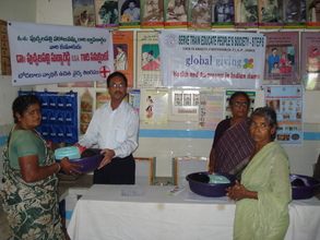 Dr.P.S.Reddy distributing medical kits to patients