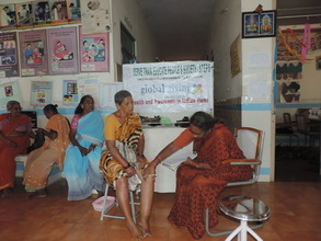 Dr Prameelamma examining  Filariasis patient