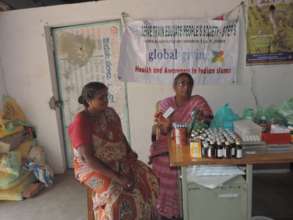 Dr Prameelamma explaining about medicines