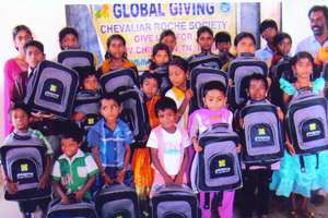 BENEFICIARIES WITH GLOBAL GIVING EMBLEMMED BAGS