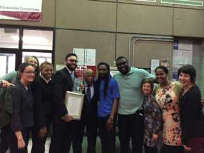 John Lewis and Andrew Aydin with Free Minds Team