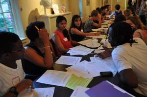 Write Night volunteers commenting on member poems