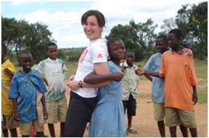 Jane playing games with children