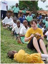 Jane teaching children how to row