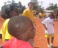 Johann joins the children in a game