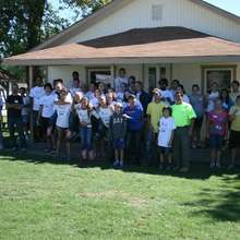 Volunteers in front of John & Sharon's House