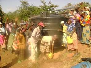 Community Comes Together To Install A New Cistern