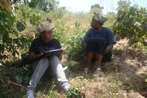 Triza Visiting A Farmer, Collecting Baseline Data