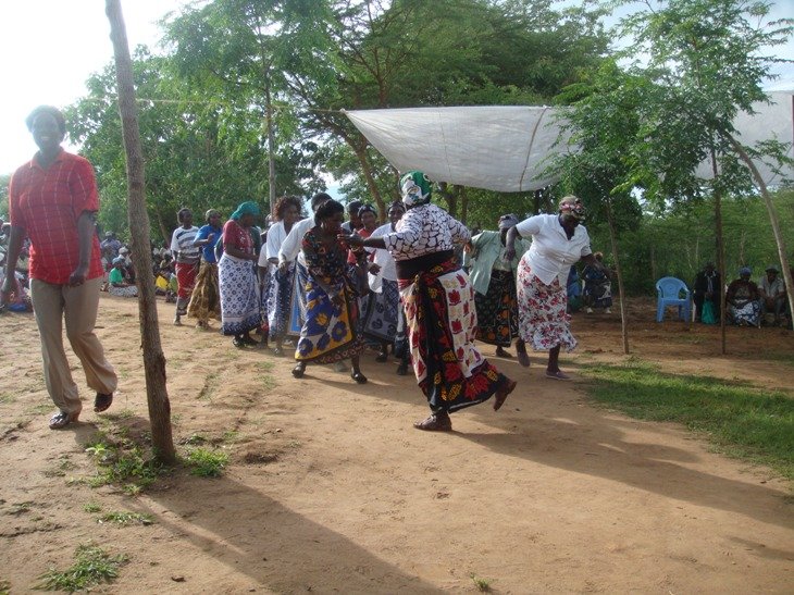 Farmers dance to celebrate after planting trees