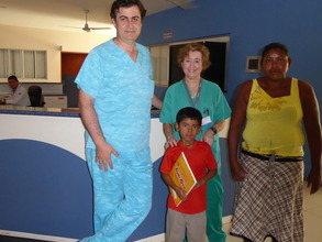 Andro with the team cardiologist and his mother