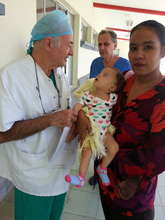 Dr. Metras Greets Baby Lesyenia Before Surgery