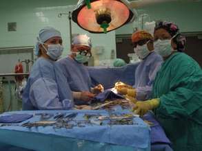 Dr. Metras with Surgical Team