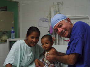 Dr. Metras with a little patient in Nicaragua