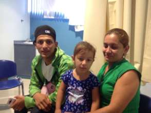 Jany (5) with her parents; home now in Leon