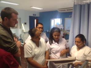 Team confers about patient