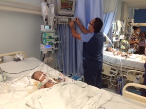 Babies in ICU following successful surgery.