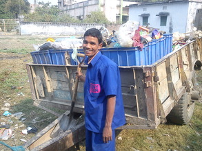 Mr. Chandan's happy to be done loading the tractor