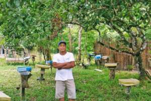 Pak Amir with his bee boxes