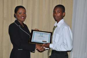 CEO Nikiki Bogle awards Ravorn a Scholarship 2010