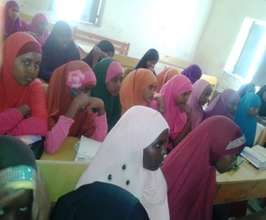 A primary school girls' club meeting
