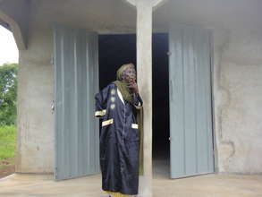 Gushie's elder, Magazia at the Gushie silo gates.
