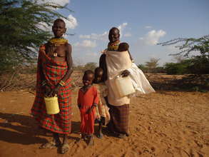 Mary and Lucy with their grandchildren