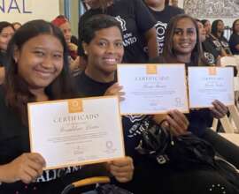 Graduates receive their certificates of completion