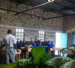 Lucien teaching primary students about hygiene