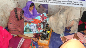 women sewing for income