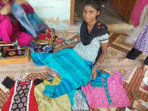 Girls earning income by sewing for their education