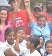 Principal (in blue) and donors celebrate!