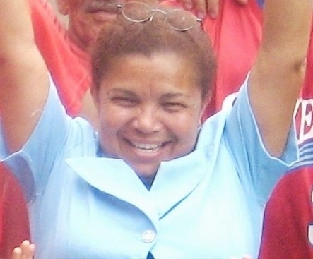 Maribel celebrates her new rain catchment tank