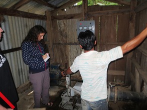 Diana, EWB-UK volunteer engineer, assessing MHP