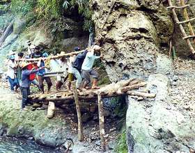 Villagers Hauling Turbine for Microhydro Project