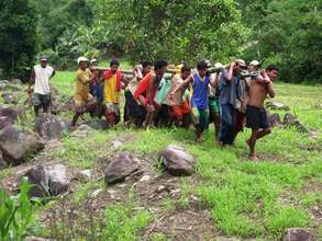 Villagers Hauling Turbine for Microhydro Project