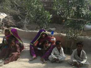 Women siting at the shadow of tree