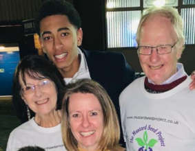 Jude with three trustees of Mustard Seed
