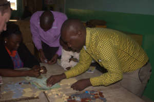 Teachers learning to follow a Lego plan