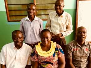 Happy teachers in new school building