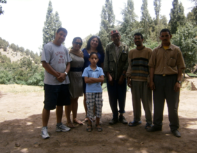 Us with Abderrahim, Omar, and government officials